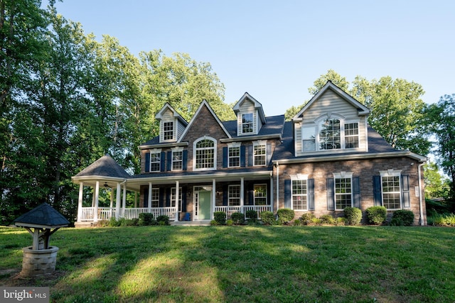 3565 Sauvignon Ln, Chesapeake Beach, MD 20732 - colonial inspired home featuring covered porch and a front yard
