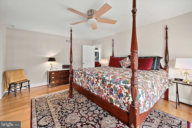 30558 Luff Ln Unit C-14, Ocean View, DE 19970 - bedroom featuring wood finished floors, baseboards, and a ceiling fan