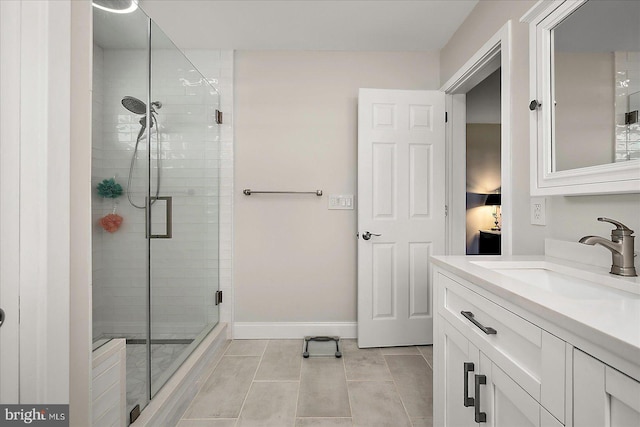 30558 Luff Ln Unit C-14, Ocean View, DE 19970 - bathroom featuring vanity, tile patterned floors, a shower stall, and baseboards