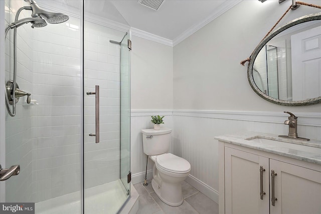 30558 Luff Ln Unit C-14, Ocean View, DE 19970 - bathroom with a stall shower, vanity, toilet, crown molding, and wainscoting