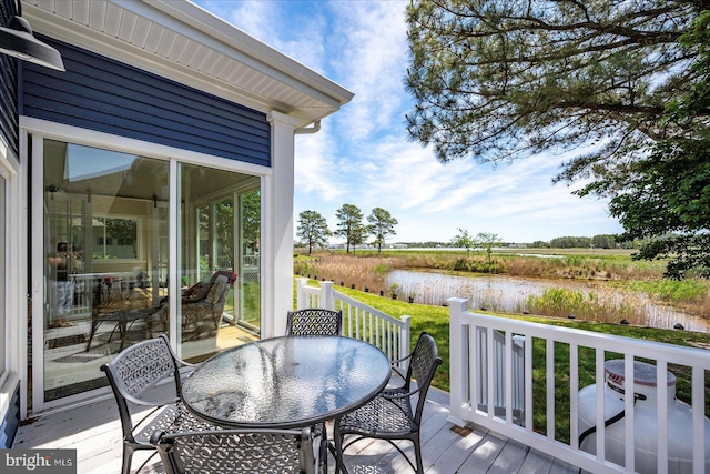30558 Luff Ln Unit C-14, Ocean View, DE 19970 - deck with outdoor dining area, a water view, and a rural view