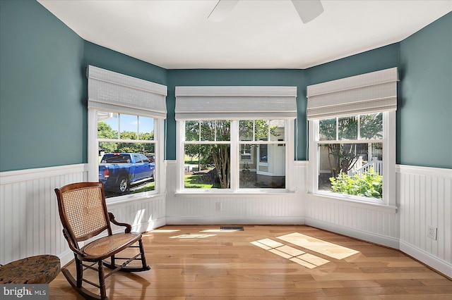 30558 Luff Ln Unit C-14, Ocean View, DE 19970 - unfurnished room featuring wainscoting, a ceiling fan, hardwood / wood-style floors, and plenty of natural light