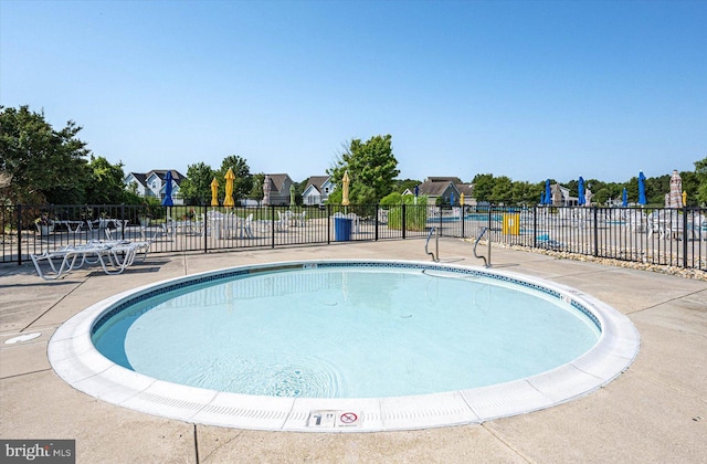 30558 Luff Ln Unit C-14, Ocean View, DE 19970 - community pool with a patio and a residential view