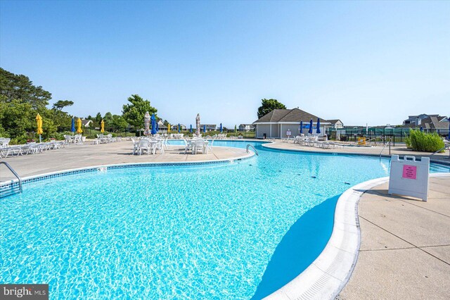 30558 Luff Ln Unit C-14, Ocean View, DE 19970 - community pool with a patio area