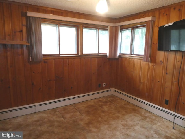 2358 Atco Ave, Atco, NJ 08004 - empty room featuring wooden walls, a baseboard radiator, and a textured ceiling