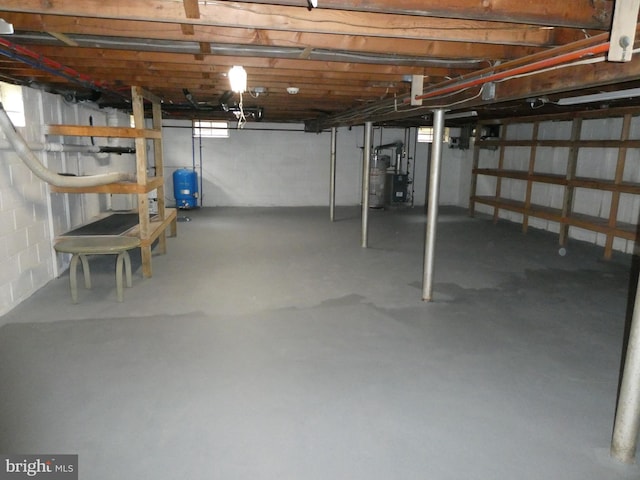 2358 Atco Ave, Atco, NJ 08004 - unfinished below grade area with water heater and a water pressure tank