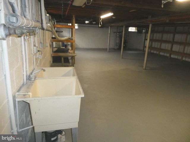 2358 Atco Ave, Atco, NJ 08004 - unfinished basement with water heater and a sink