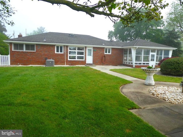 2358 Atco Ave, Atco, NJ 08004 - back of property with brick siding, a sunroom, cooling unit, and a chimney