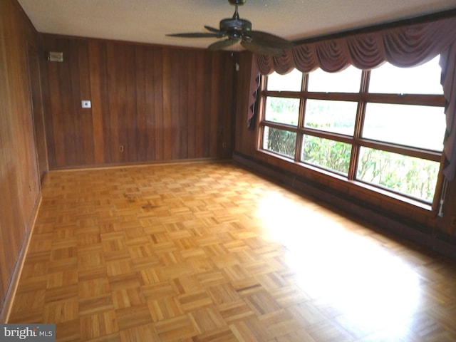 2358 Atco Ave, Atco, NJ 08004 - empty room featuring wooden walls, baseboards, and ceiling fan