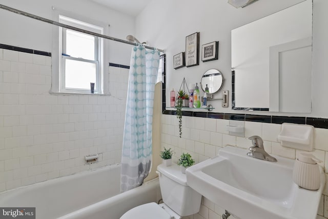 4825 3rd St NW, Washington, DC 20011 - full bath featuring shower / bath combo, tile walls, and a wainscoted wall