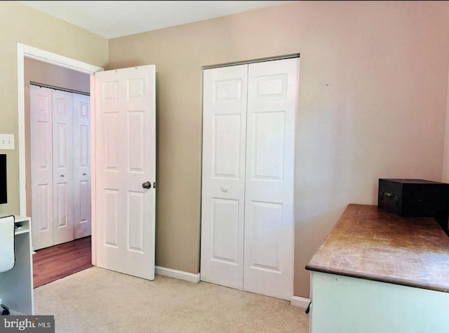 608 Tacketts Mill Rd, Stafford, VA 22556 - kitchen featuring light colored carpet and baseboards