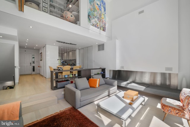 3927 Georgetown Ct NW, Washington, DC 20007 - living area featuring a high ceiling and recessed lighting
