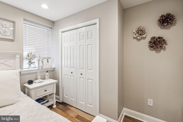 2305 S Croskey St, Philadelphia, PA 19145 - bedroom with a closet, wood finished floors, baseboards, and recessed lighting