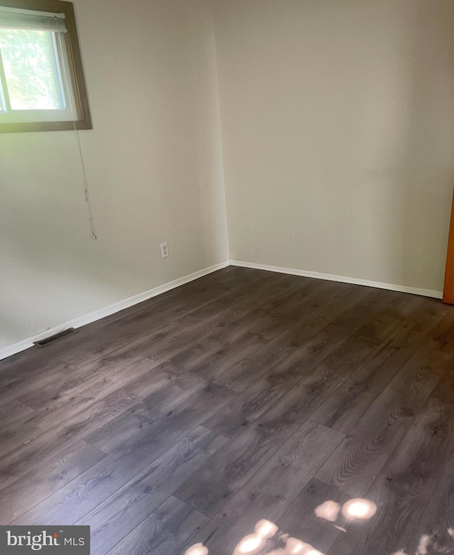 2541 Secane Rd, Secane, PA 19018 - spare room featuring dark wood-type flooring and baseboards