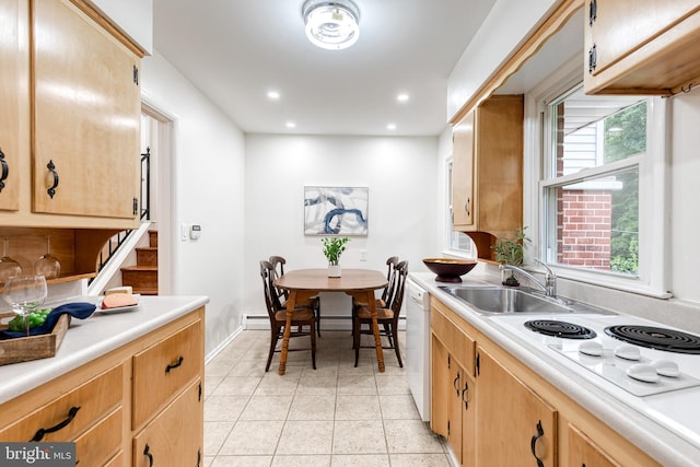 522 Goucher Blvd, Baltimore, MD 21286 - kitchen with white appliances, light countertops, a sink, light tile patterned floors, and recessed lighting