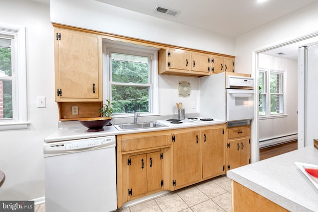 522 Goucher Blvd, Baltimore, MD 21286 - kitchen featuring white appliances, a sink, a baseboard radiator, and light countertops