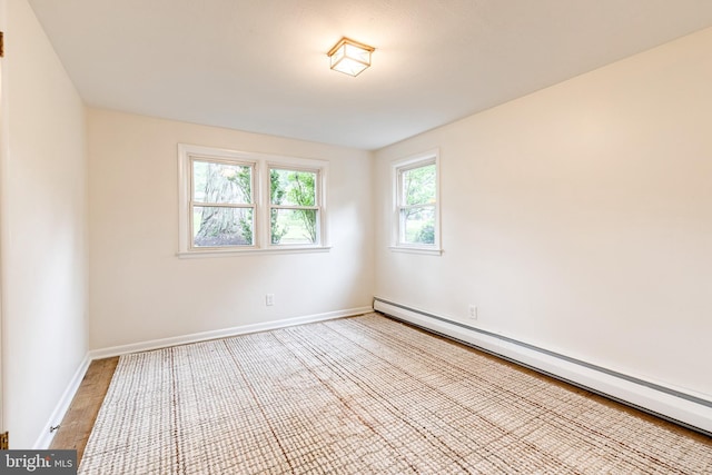 522 Goucher Blvd, Baltimore, MD 21286 - spare room featuring a baseboard heating unit and baseboards