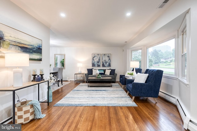 522 Goucher Blvd, Baltimore, MD 21286 - living room with wood finished floors, recessed lighting, baseboards, and baseboard heating