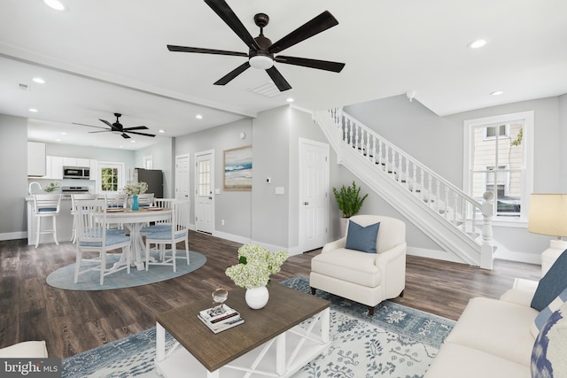 305 Willis St, Cambridge, MD 21613 - living room with a ceiling fan, baseboards, stairs, wood finished floors, and recessed lighting