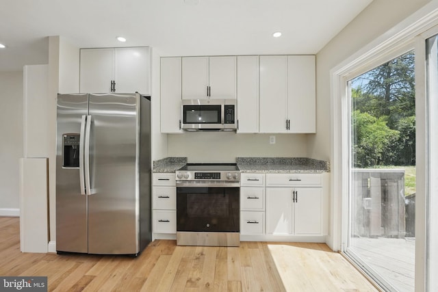 13798 Gresham Ct, Woodbridge, VA 22193 - kitchen featuring appliances with stainless steel finishes, light wood-style floors, white cabinetry, recessed lighting, and light stone countertops