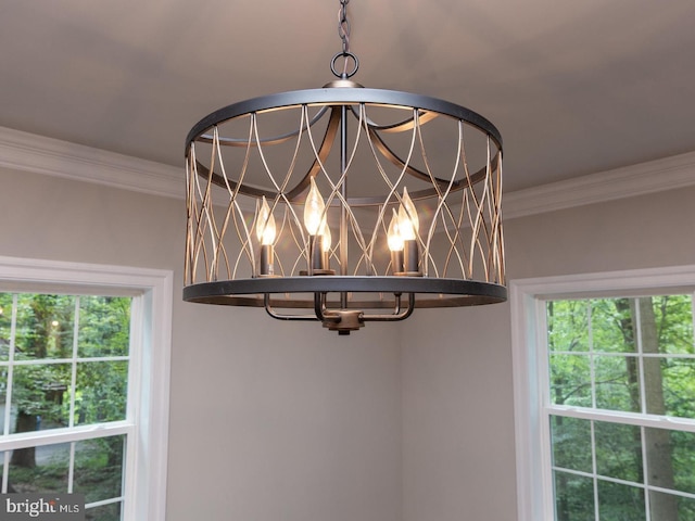 detailed view of a chandelier and crown molding