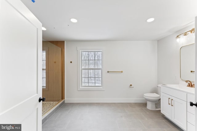 full bathroom featuring vanity, baseboards, recessed lighting, toilet, and a stall shower