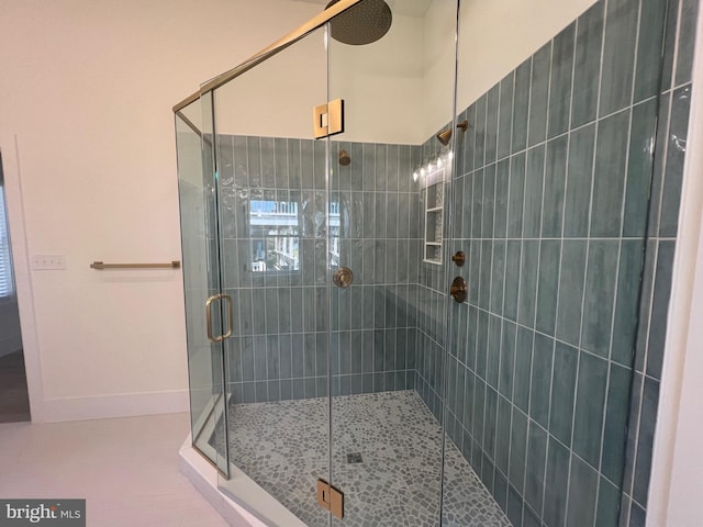 full bathroom featuring a shower stall