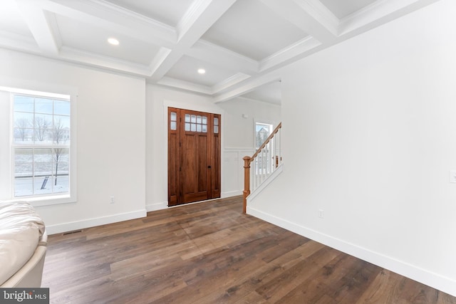 foyer entrance featuring coffered ceiling, dark wood-style flooring, beamed ceiling, recessed lighting, and stairs