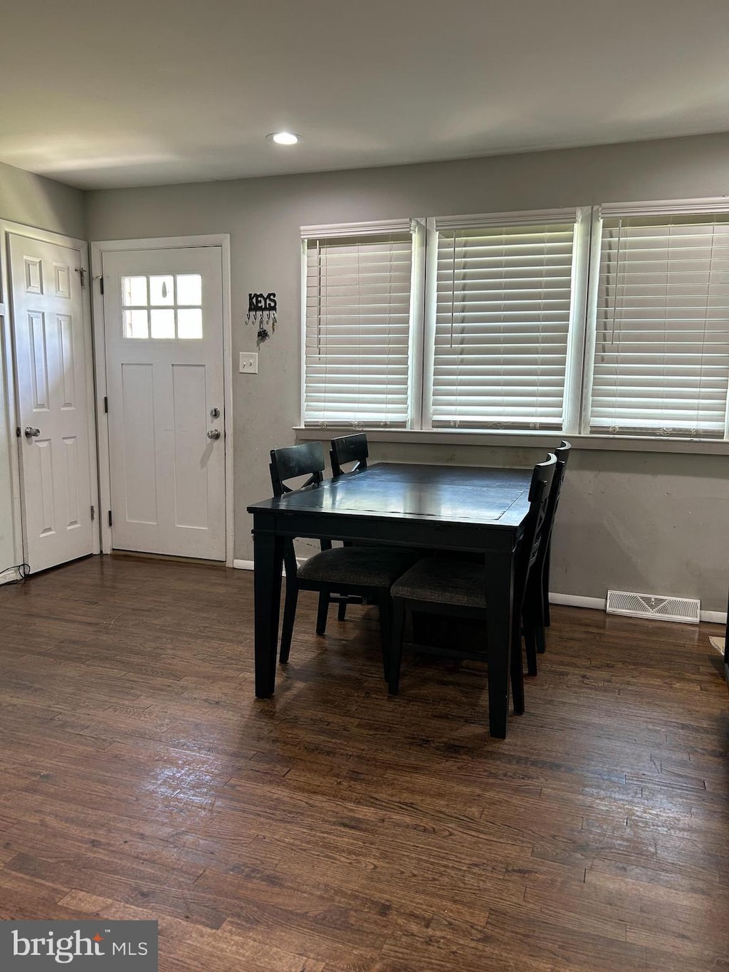 1258 W Cornell St, Vineland, NJ 08360 - dining area featuring baseboards, dark wood-style flooring, and recessed lighting