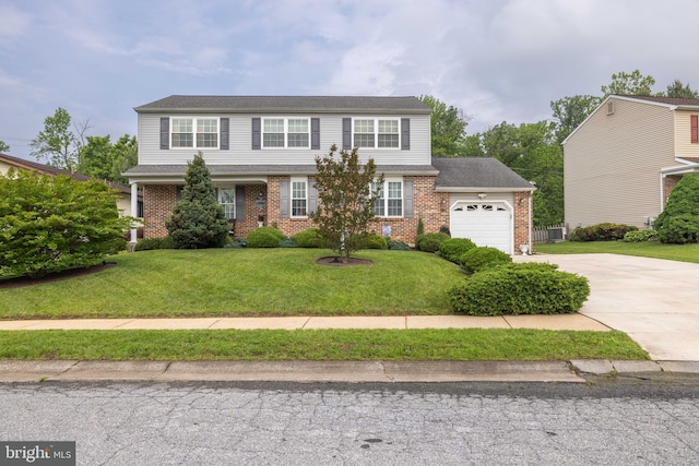 13 Berley Ct, Newark, DE 19702 - view of front facade featuring a garage, brick siding, concrete driveway, and a front yard