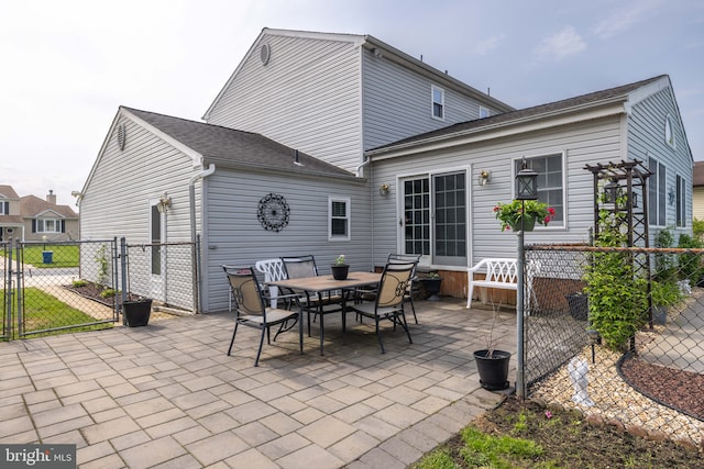 13 Berley Ct, Newark, DE 19702 - rear view of property featuring a patio, a gate, and outdoor dining space