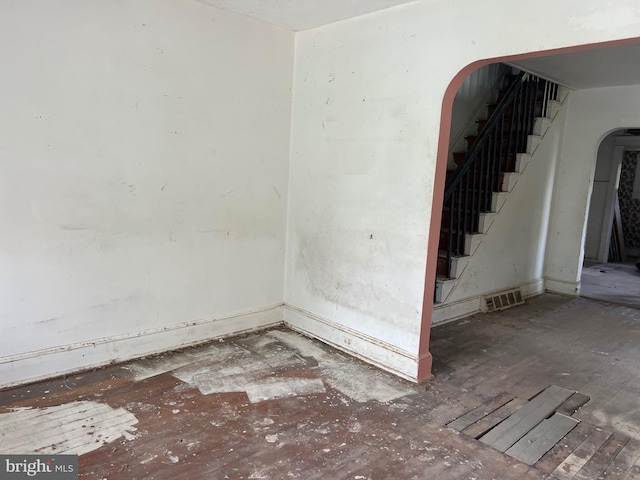 303 Johnson Ave, Upper Chichester, PA 19061 - spare room featuring arched walkways and stairway