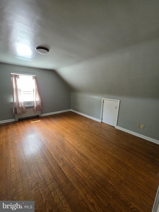 616 Sylvan Pl, Harrisburg, PA 17109 - bonus room featuring lofted ceiling, hardwood / wood-style flooring, and baseboards