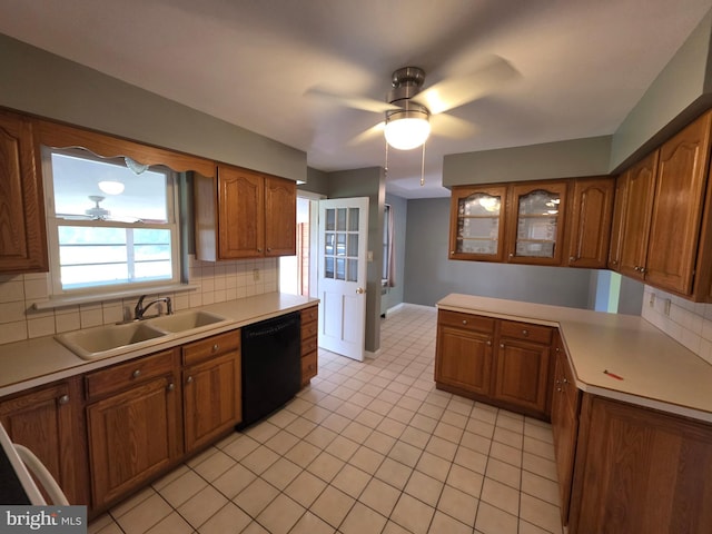 616 Sylvan Pl, Harrisburg, PA 17109 - kitchen featuring a sink, black dishwasher, ceiling fan, and backsplash