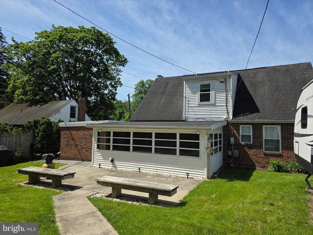 616 Sylvan Pl, Harrisburg, PA 17109 - rear view of house featuring brick siding and a shingled roof