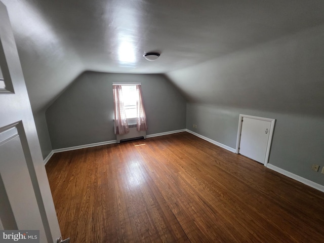 616 Sylvan Pl, Harrisburg, PA 17109 - additional living space featuring dark wood-type flooring, lofted ceiling, and baseboards