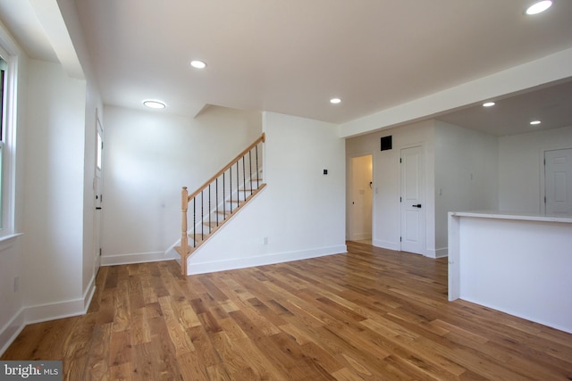 2 Baltimore Ave, Glen Burnie, MD 21061 - spare room featuring light wood-style floors, stairs, recessed lighting, and baseboards