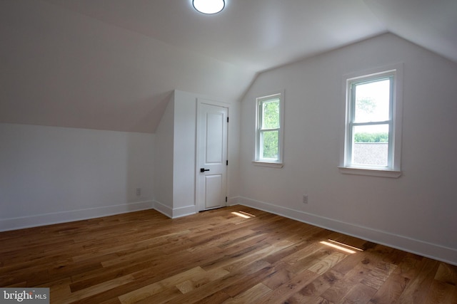 2 Baltimore Ave, Glen Burnie, MD 21061 - additional living space featuring lofted ceiling, wood finished floors, and baseboards