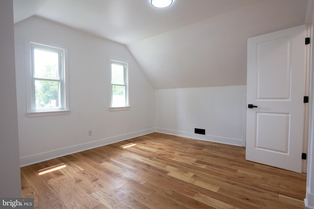 2 Baltimore Ave, Glen Burnie, MD 21061 - additional living space featuring lofted ceiling, light wood-type flooring, and baseboards