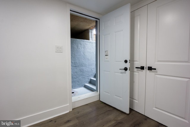2 Baltimore Ave, Glen Burnie, MD 21061 - doorway with dark wood finished floors and baseboards