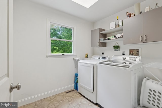 504 Ridge Dr, Douglassville, PA 19518 - washroom featuring washing machine and dryer, cabinet space, and baseboards