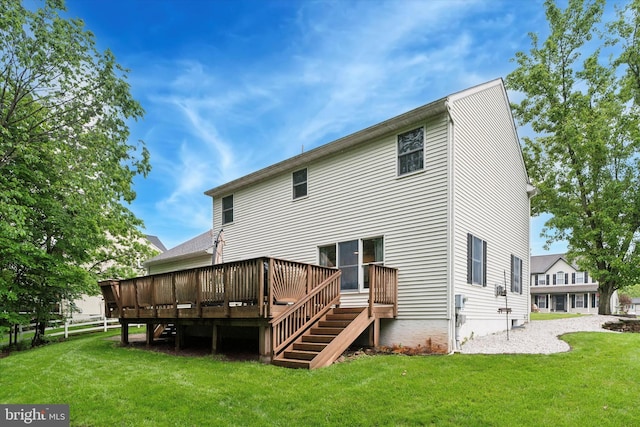 504 Ridge Dr, Douglassville, PA 19518 - back of property featuring a yard and a wooden deck