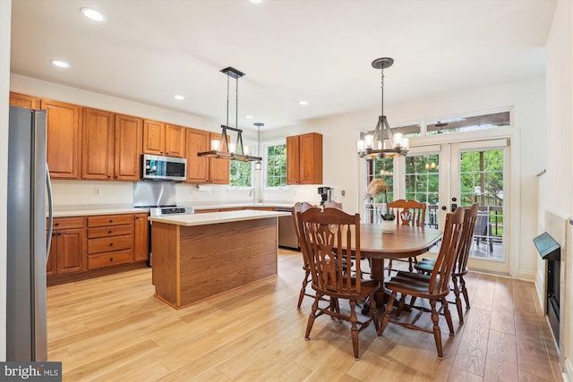 831 Macalister Dr SE, Leesburg, VA 20175 - dining room with light wood-style floors, recessed lighting, french doors, and a chandelier