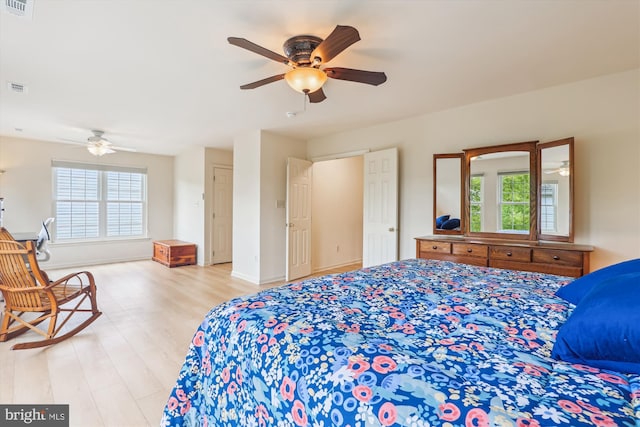 831 Macalister Dr SE, Leesburg, VA 20175 - bedroom featuring wood finished floors, baseboards, and a ceiling fan