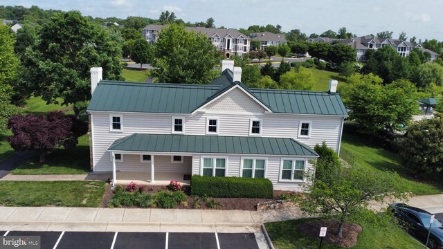 831 Macalister Dr SE, Leesburg, VA 20175 - view of building exterior featuring uncovered parking and a residential view