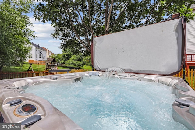 831 Macalister Dr SE, Leesburg, VA 20175 - view of swimming pool with a hot tub and a playground