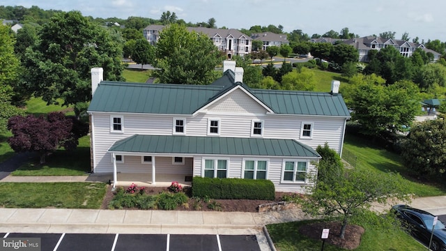 831 Macalister Dr SE, Leesburg, VA 20175 - view of building exterior featuring uncovered parking and a residential view