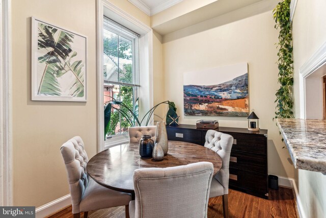 306 S 13th St Unit 8, Philadelphia, PA 19107 - dining area with wood finished floors, baseboards, and crown molding
