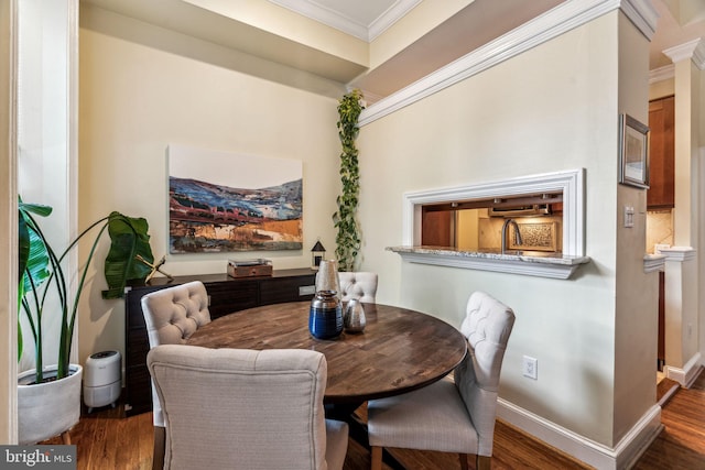 306 S 13th St Unit 8, Philadelphia, PA 19107 - dining room featuring ornamental molding, wood finished floors, and baseboards