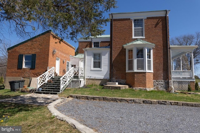 322 Main St E, Fincastle, VA 24090 - view of front of property with brick siding and a front yard